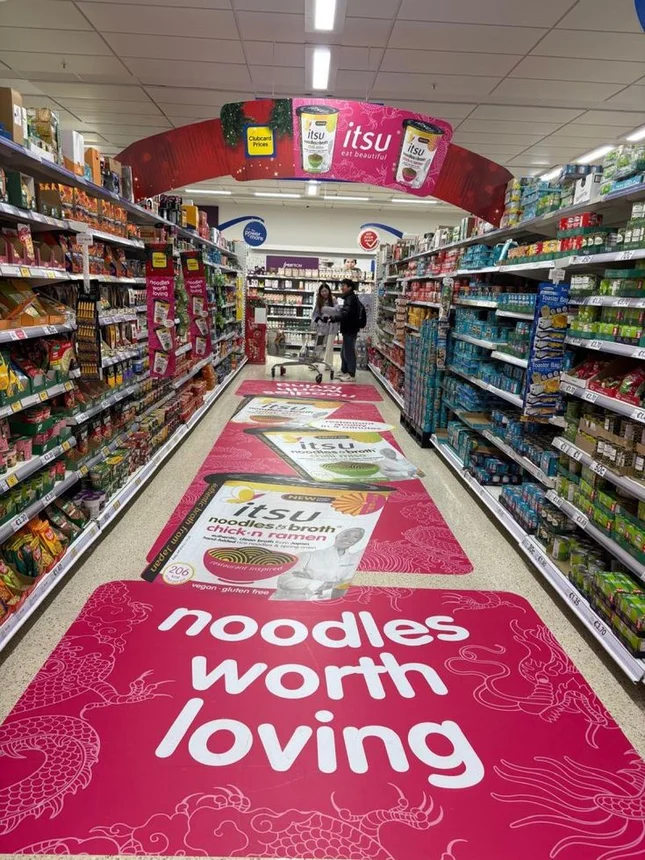 Own the aisle. Ceiling banners and promotional signage for a retail campaign